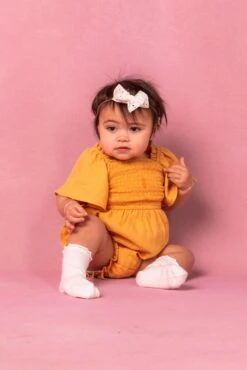 Baby Lennon Romper In Mustard 9 Baby Lennon Romper In Mustard -Ivy City Co Dress BabyLennonRomper Studio Spring24 3 107385