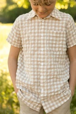 Madeline Boys Shirt In Tan Gingham - FINAL SALE 12 Madeline Boys Shirt In Tan Gingham - FINAL SALE -Ivy City Co Dress MadelineTanGingham F23 11 515ac279 d0aa 4078 b30a 739e2225f855 582862